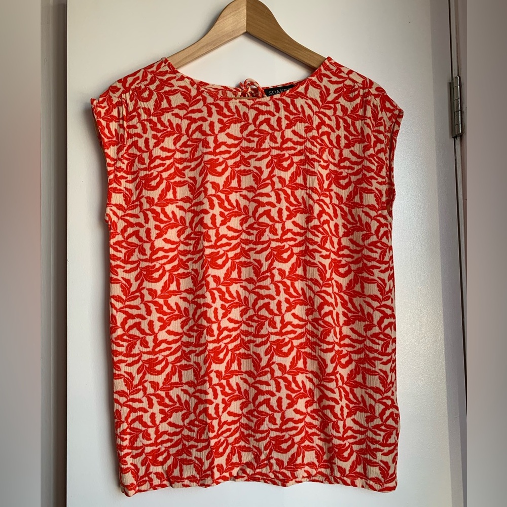 Light summer top, loose fit with red, pink and beige pattern.